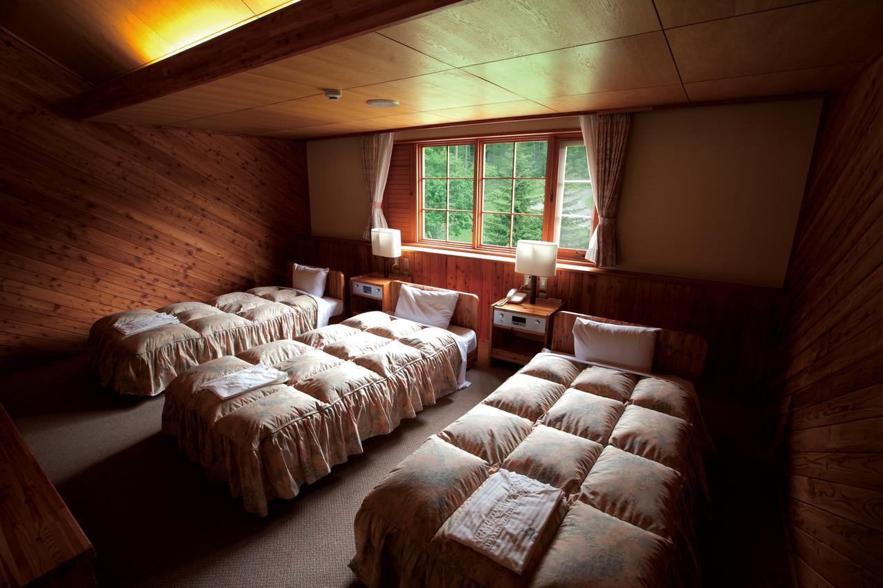 Log Hotel Larch Lake Kanayama Minamifurano Chambre photo