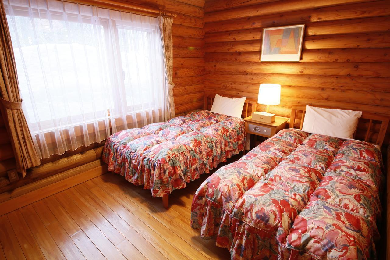 Log Hotel Larch Lake Kanayama Minamifurano Chambre photo