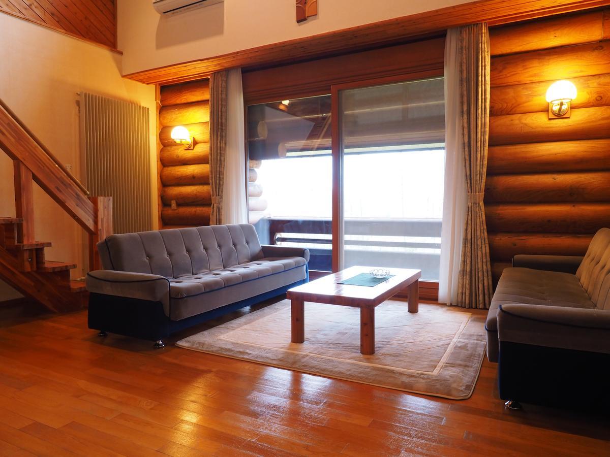Log Hotel Larch Lake Kanayama Minamifurano Chambre photo